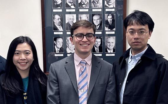 Two graduate students with a Capitol Hill staffer.