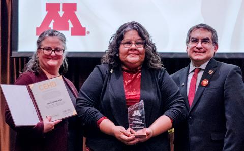 a distinguished alumni with a department head and dean